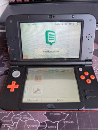 Nintendo 3DS XL Arancione + Caricatore + Pokémon Luna