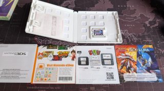 Nintendo 3DS XL Arancione + Caricatore + Pokémon Luna
