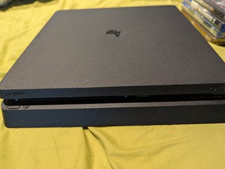 PS4 Slim 1TB + Mando + 4 Juegos