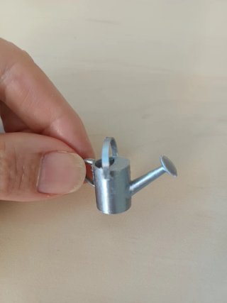 Accessori in miniatura per case delle bambole