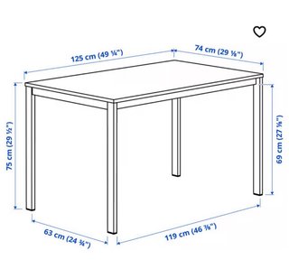 Mesa blanca de madera.