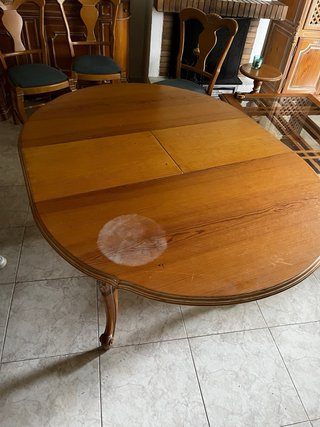 Mesa de comedor redonda de madera