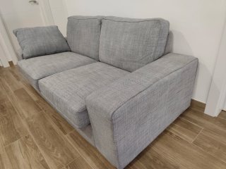 Sofá gris de tela