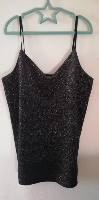 Top con bretelle scintillante nero.