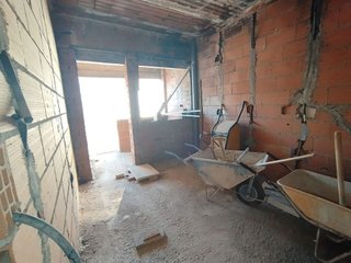 Casa adosada en venta en Tomelloso