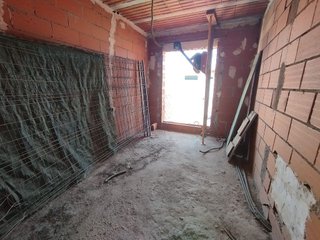 Casa adosada en venta en Tomelloso