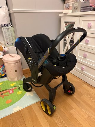 Silla coche y base Doona
