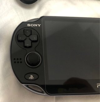 PS Vita OLED 1000 + Minecraft + caricabatterie originale