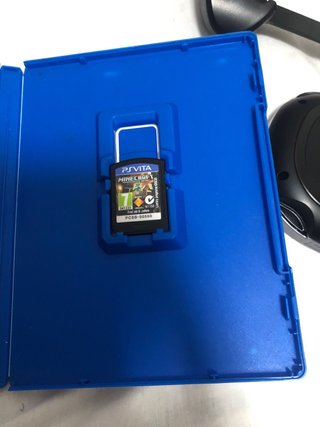 PS Vita OLED 1000 + Minecraft + caricabatterie originale