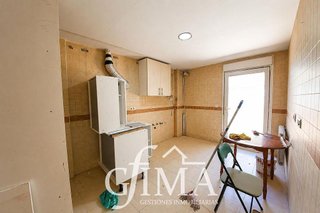 Casa adosada en venta en Tomelloso
