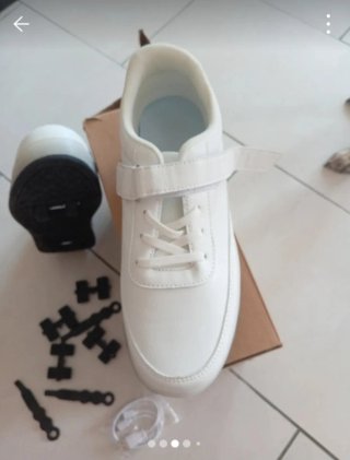 Scarpe con rotelle HUSK'SWARE