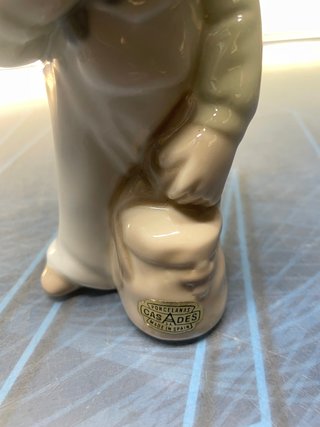 Figura porcelana Casades 18cm niño campo