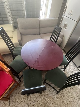 Mesa redonda con 6 sillas