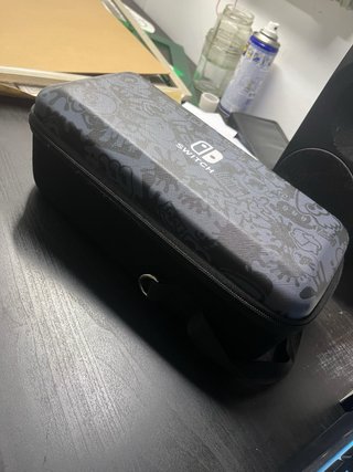 Nintendo Switch OLED e custodia