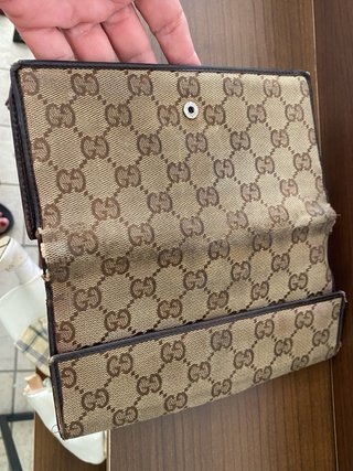 Portafoglio Gucci vintage da riparare