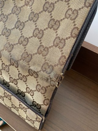 Portafoglio Gucci vintage da riparare
