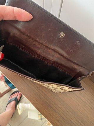Portafoglio Gucci vintage da riparare