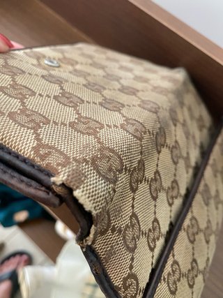 Portafoglio Gucci vintage da riparare