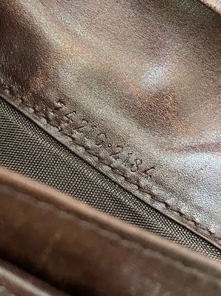 Portafoglio Gucci vintage da riparare