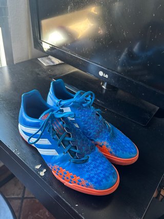 Zapatillas multitaco Adidas azules y naranjas
