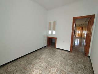 Casa adosada en venta en Tomelloso