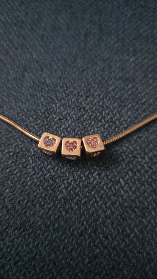 Conjunto collar y pendientes dorados