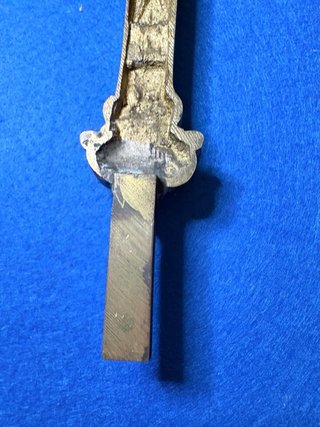Cruz de bronce con crucificado