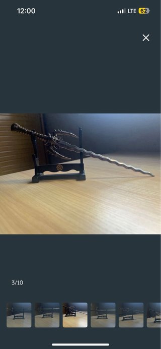 Espada decorativa con soporte