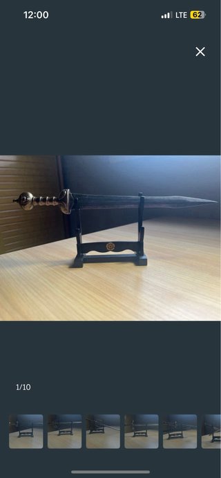 Espada decorativa con soporte