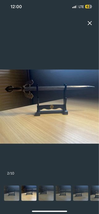 Espada decorativa con soporte