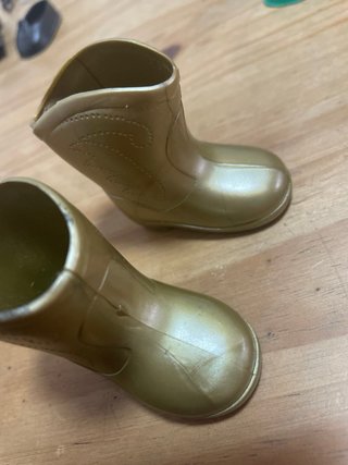 Botas doradas nancy de famosa