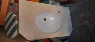 Lavabo de mármol y porcelana