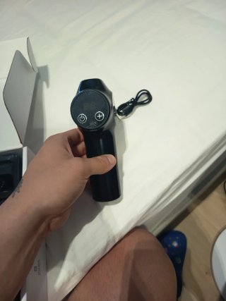 Pistola de masaje.