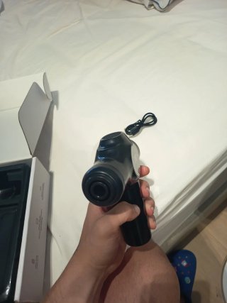 Pistola de masaje.