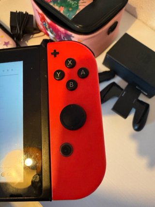 Nintendo Switch + Accessori + Custodia + Valigetta