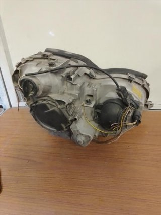 Faro izquierdo Mercedes Benz Clase C (W203 b_28946