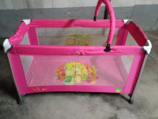 Cuna de viaje rosa + colchón