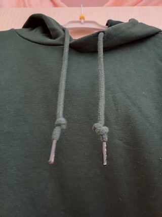 Sudadera verde con capucha