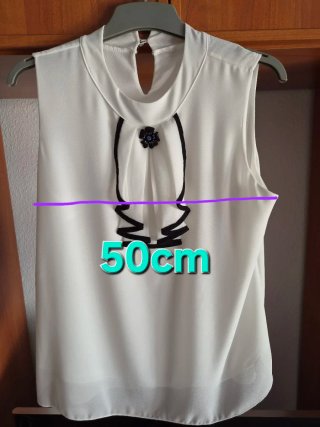 Elegante blusa sin mangas