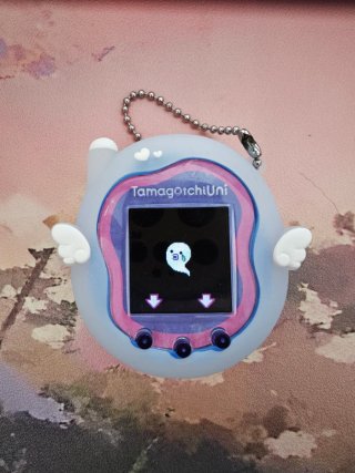 Tamagotchi Uni Blue Azul + Funda Ángel