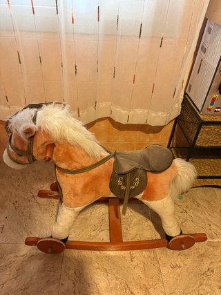 Caballo balancín infantil