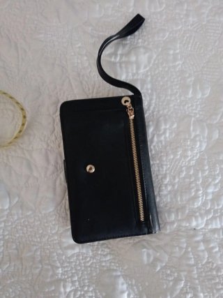 Cartera móvil negra y marrón