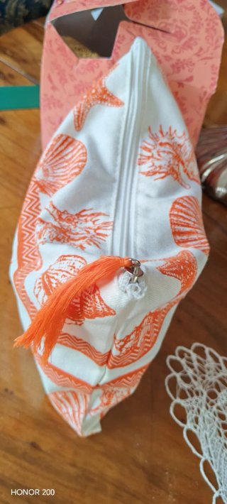 Pochette Dr. Klein con conchiglie