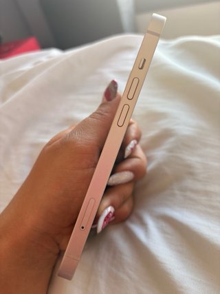 iPhone 13 Rosa con marcas de uso