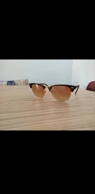 Gafas de sol Ray-Ban marrones y doradas