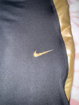 Mallas Nike Negro y Dorado