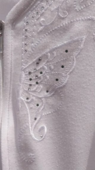 Chaqueta blanca con bordado y cremallera
