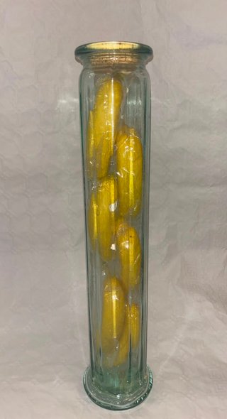 Frasco decorativo cristal con bananas artificiales