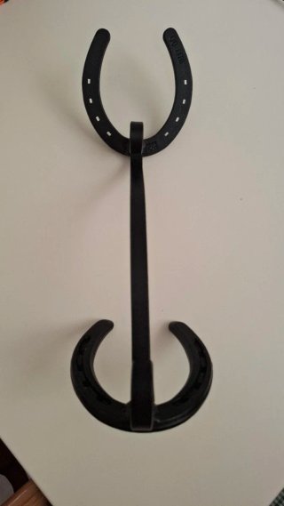Colgador de sombrero de herradura