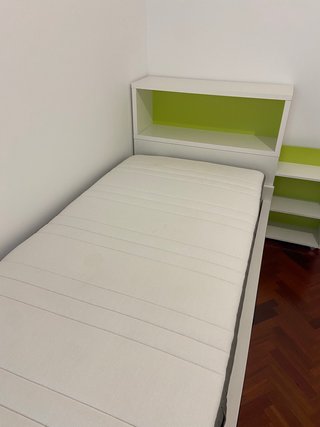 Cama nido con cajones y estantería